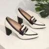 Newness Metropolitan Flair Two Tone Block Heels Chic two tone block heels perfect for elevating any outfit Experience comfort and style