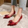 Golden stiletto heels with elegant bow featuring a comfortable insole and slip resistant sole perfect for weddings and events