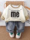 Stylish boys two piece autumnwinter outfit featuring a trendy letter print hoodie and comfortable jeans perfect for back to school holidays or parties