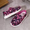 Adorable girls heart canvas loafers in a trendy slip on style perfect for casual wear and outdoor fun Comfortable and stylish these heart patterned shoes are ideal for all seasons