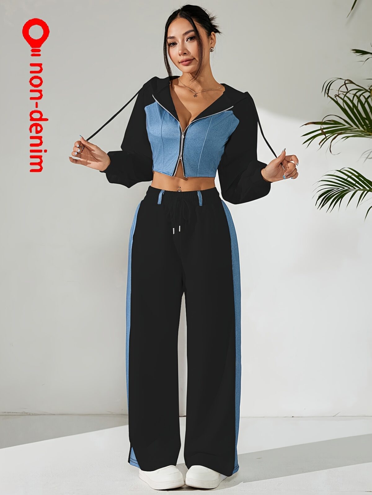 Skyline Chic Two Piece Set Flatlay of a stylish zip up hoodie and wide leg pants in a complementary color scheme Perfect for spring or fall