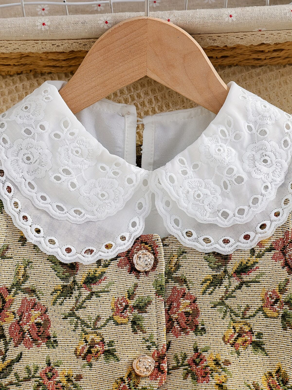 Newness Kensington Jacquard Floral Dress A chic and elegant floral dress perfect for spring Close up view showing the intricate jacquard fabric and flattering silhouette