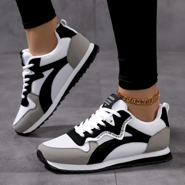 Newness City Stroll Striped Casual Sneakers Effortlessly stylish striped sneakers perfect for all day wear Image shows the sneakers from a side angle highlighting their comfortable design and vibrant stripes