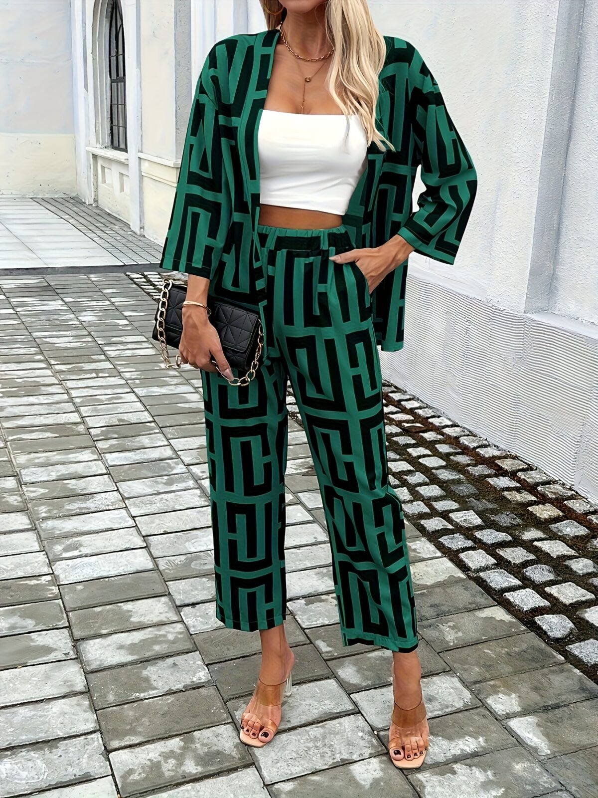 The Newness Modern Muse Geometric Print Set a chic two piece outfit featuring a modern geometric print perfect for any occasion