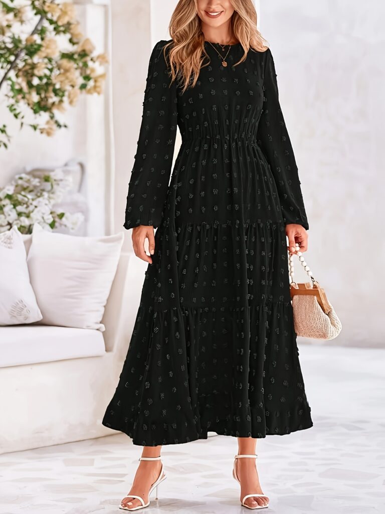 Model wearing the Noémie Geometric Maxi Dress, a stylish maxi dress with a geometric pattern, perfect for spring and fall events.