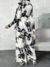 Newness Casablanca Tie Dye Two Piece Set Chic and sophisticated tie dye two piece outfit perfect for fall Features a stylish top and matching bottoms in a trendy dye pattern