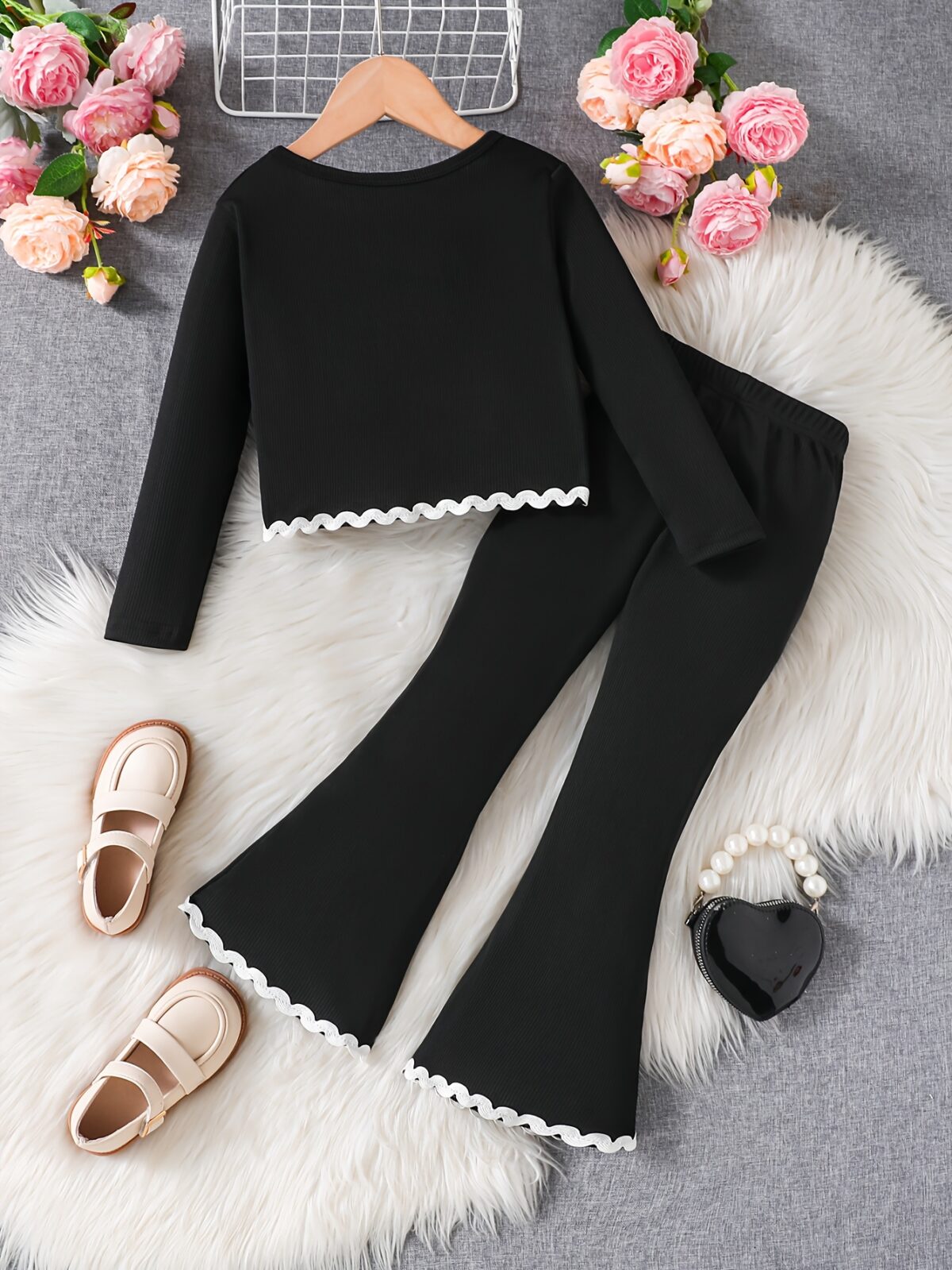 Newness girls chic ruffle pants set in pink ideal for spring and autumn The set features a comfortable top and stylish pants with ruffles
