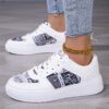 Whimsical White Cartoon Style Sneakers by Newness Chic comfortable and effortlessly cool white sneakers with a cartoon inspired design