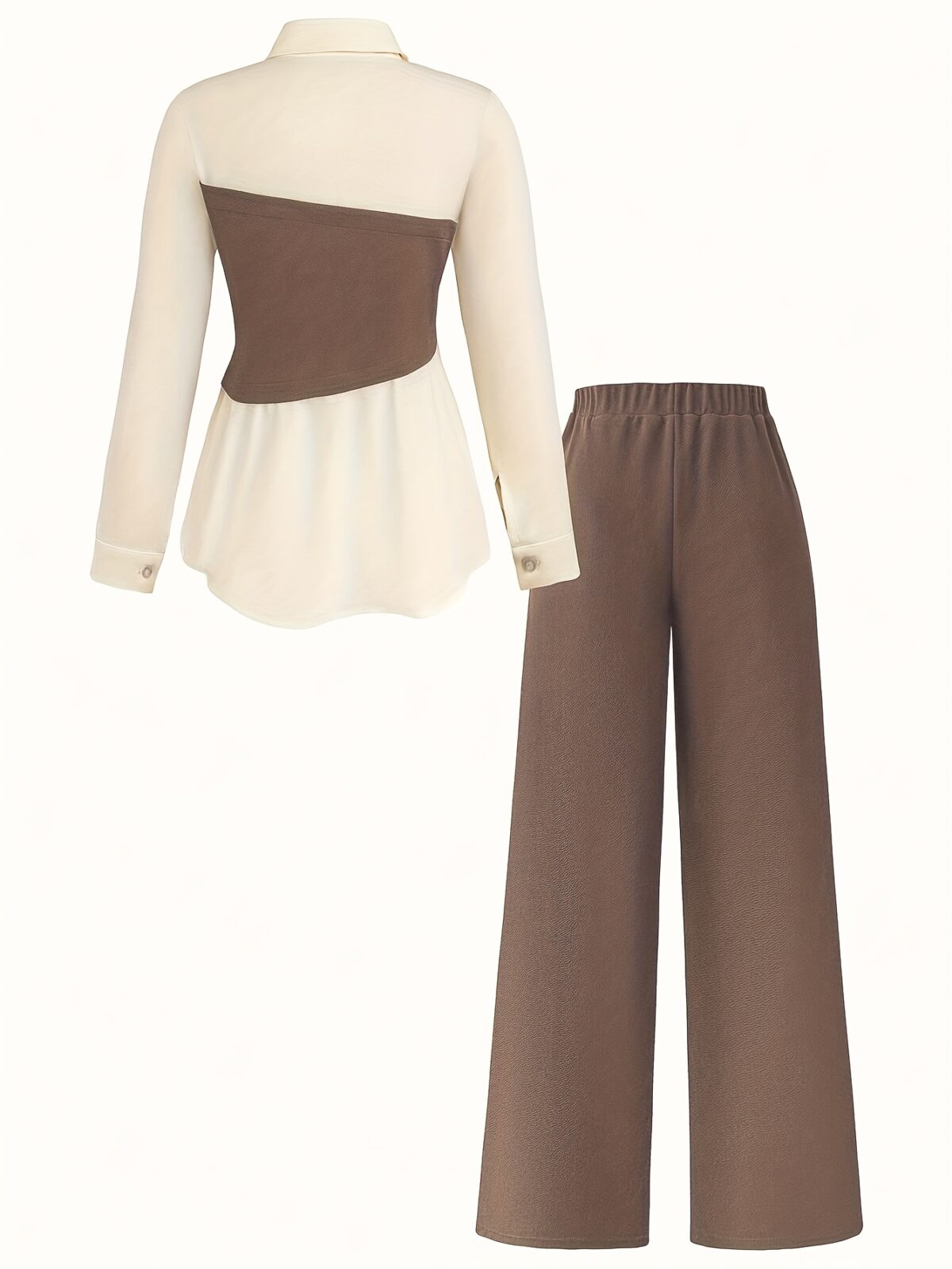 Model wearing the Newness Metropolitan Chic Two Piece Pant Set a stylish and comfortable pant set perfect for the office or everyday wear The set includes a matching top and pants in a versatile color