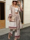 Model showcasing the Newness Dubai Nights Digital Print Suit a chic and sophisticated digital print suit ideal for spring and fall The suit features a flattering silhouette and vibrant print