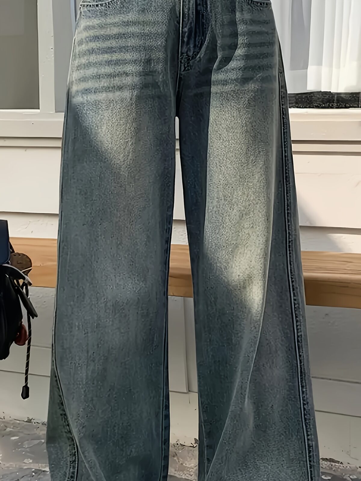 Effortless Chic Wide Leg Jeans by Newness in premium denim showcasing a modern and chic wide leg silhouette