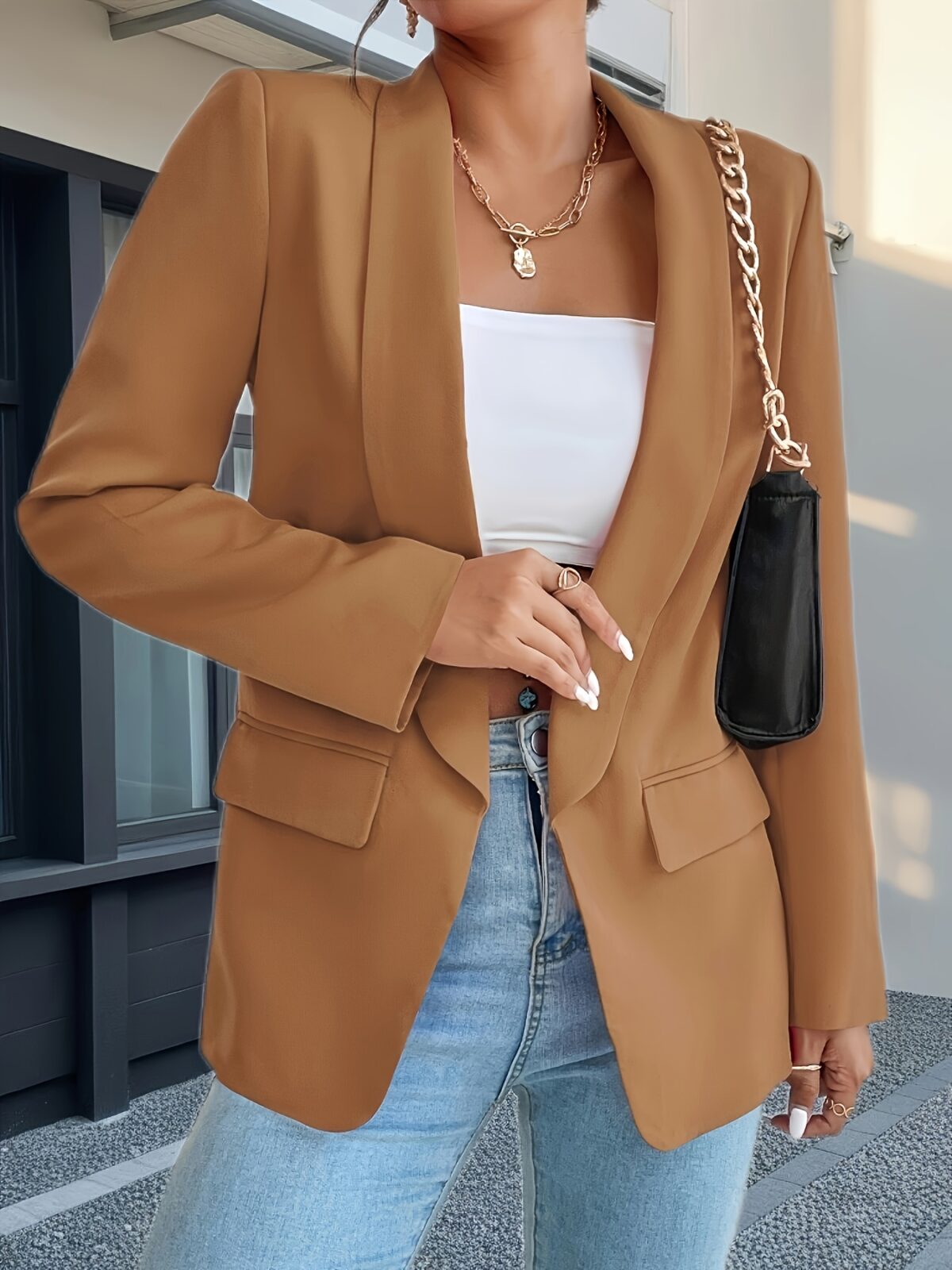 Corporate Chic Womens Solid Color Lapel Collar Blazer in versatile navy blue ideal for the office semi formal events or casual wear Features a flattering lapel collar and is made from durable easy care polyester