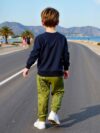 Stylish boys dinosaur print sweatshirt and pants set perfect for active play Features a vibrant dinosaur print on a comfortable versatile outfit suitable for school playtime and everyday wear Ages 4 7