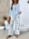 Stylish woman wearing the Newness Parisian Chic Printed Pants Set showcasing the comfortable and chic design
