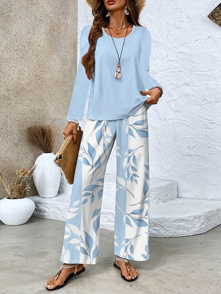 Stylish woman wearing the Newness Parisian Chic Printed Pants Set, showcasing the comfortable and chic design.