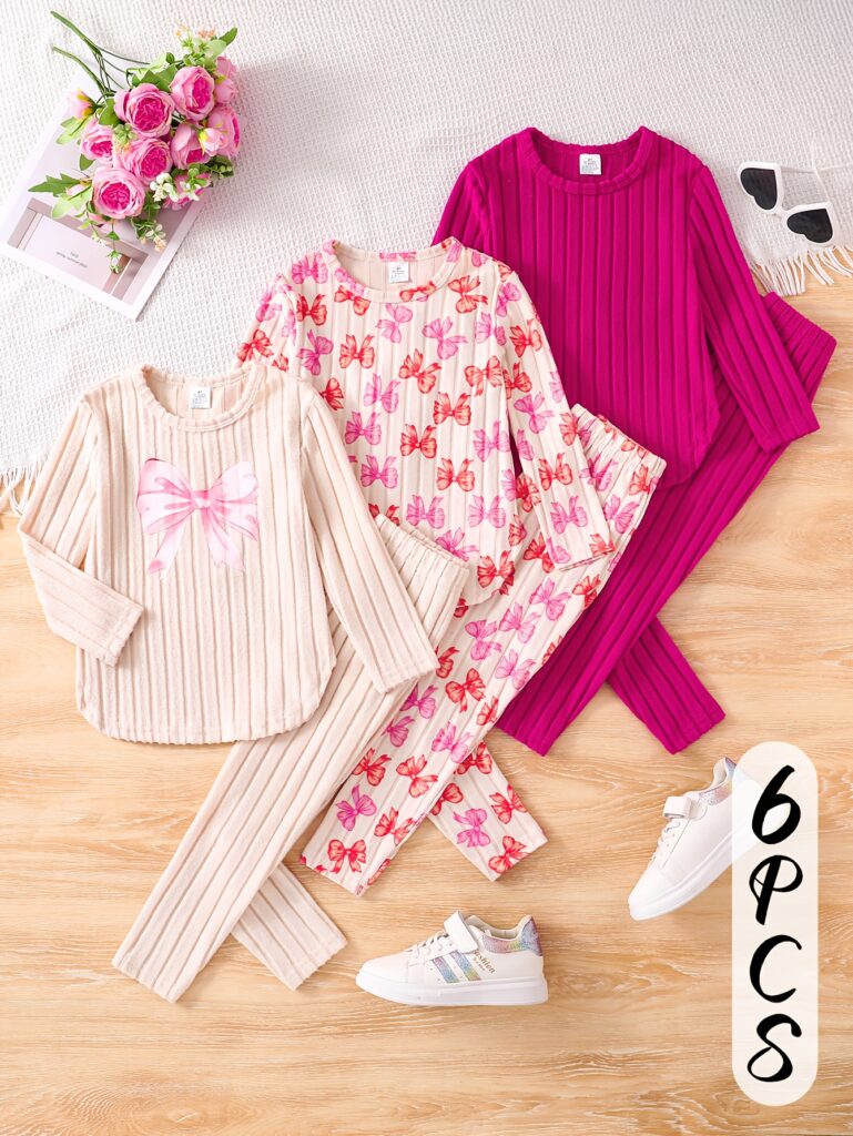 Adorable girls' striped pants set, perfect for spring, summer, or fall. Features a stylish and comfortable design.