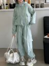 Girl wearing a stylish hooded suit perfect for spring Dubai inspired design