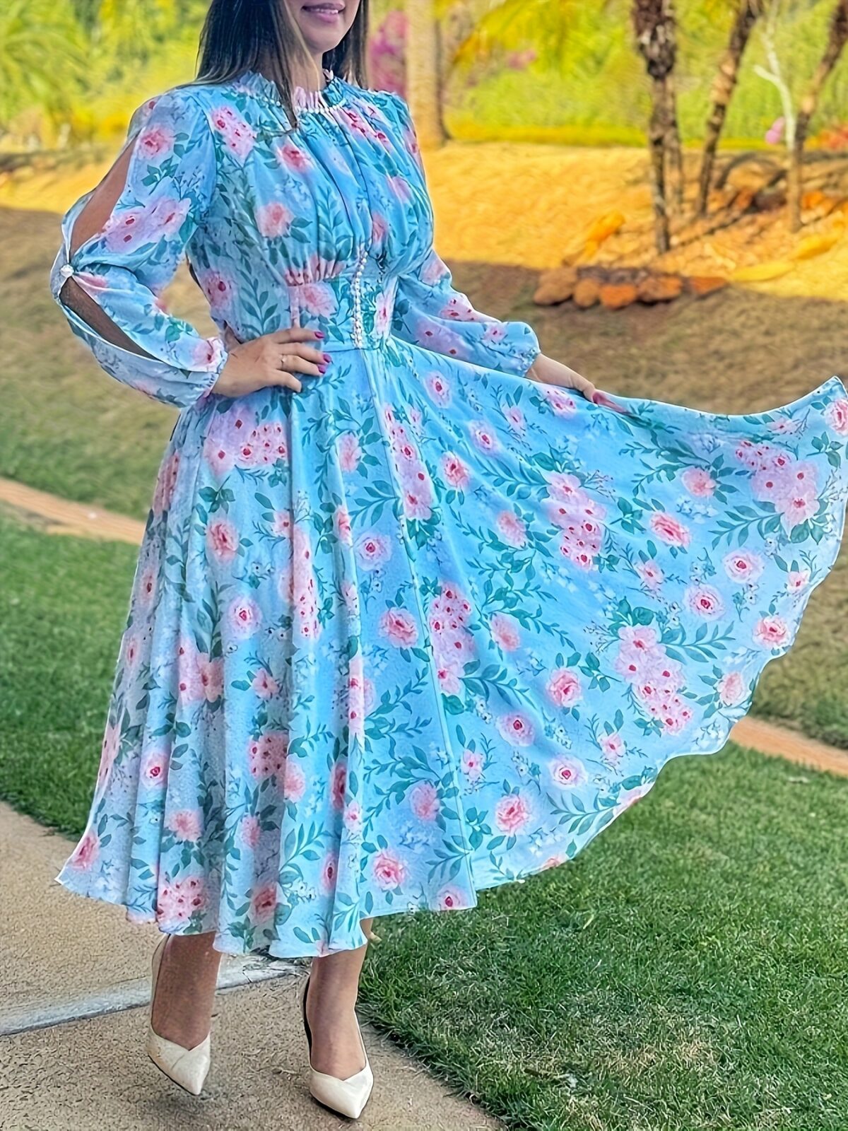 Embrace Parisian chic in the Newness Azure Bloom Floral Print Dress This stunning summer dress features a vibrant floral print