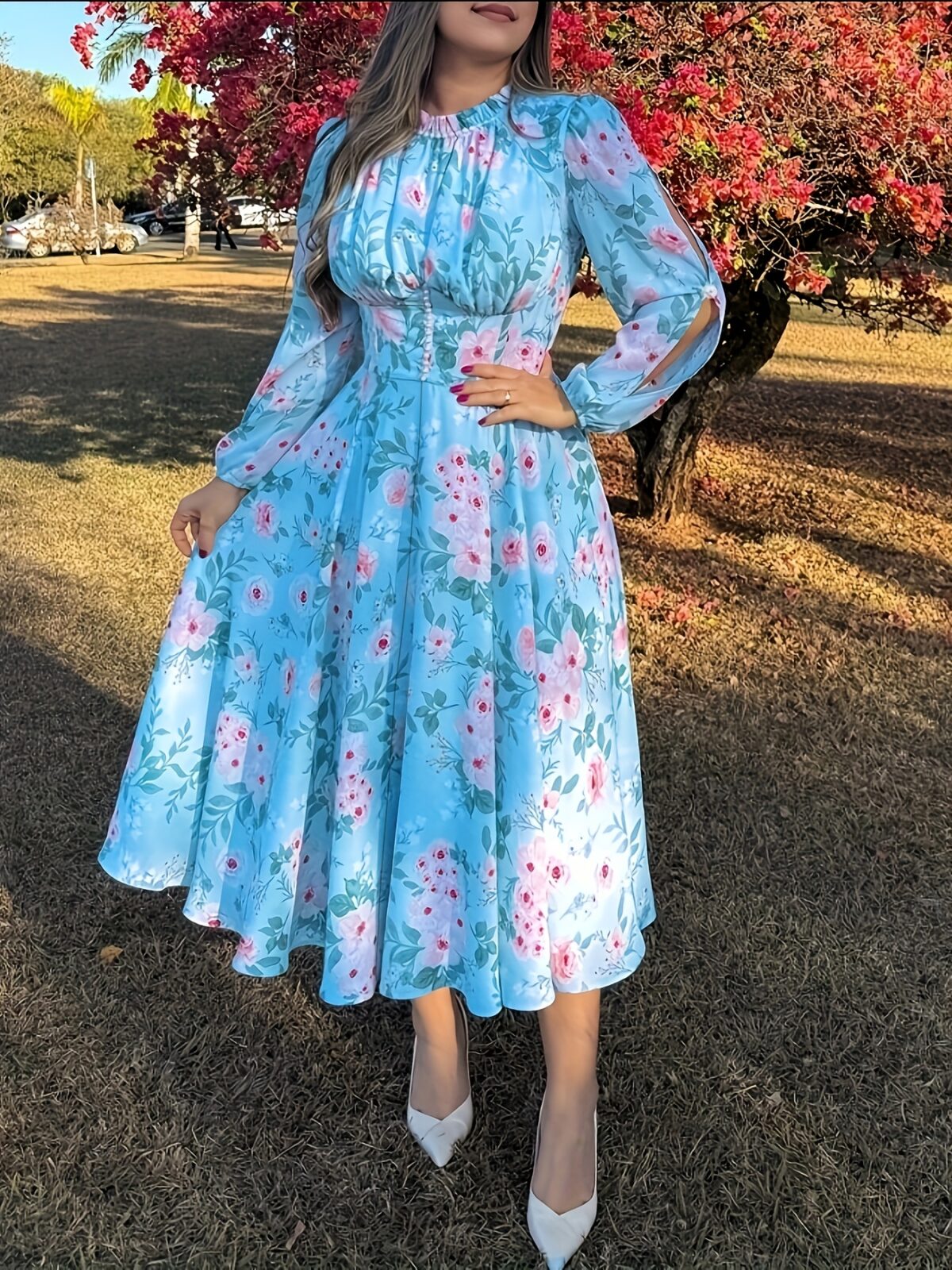 Embrace Parisian chic in the Newness Azure Bloom Floral Print Dress This stunning summer dress features a vibrant floral print