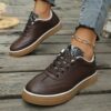Newness Urban Edge Retro Snake Sneakers Chic and comfortable sneakers with a retro snake print design perfect for any occasion