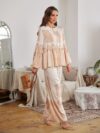 Model wearing a stunning two piece wide leg pants set with a vibrant Dubai Nights print The set is made of luxurious viscose