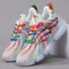 Newness Prism Rainbow Stripe Sneakers A vibrant pair of rainbow striped sneakers showcasing breathable comfort and stylish design perfect for all day wear