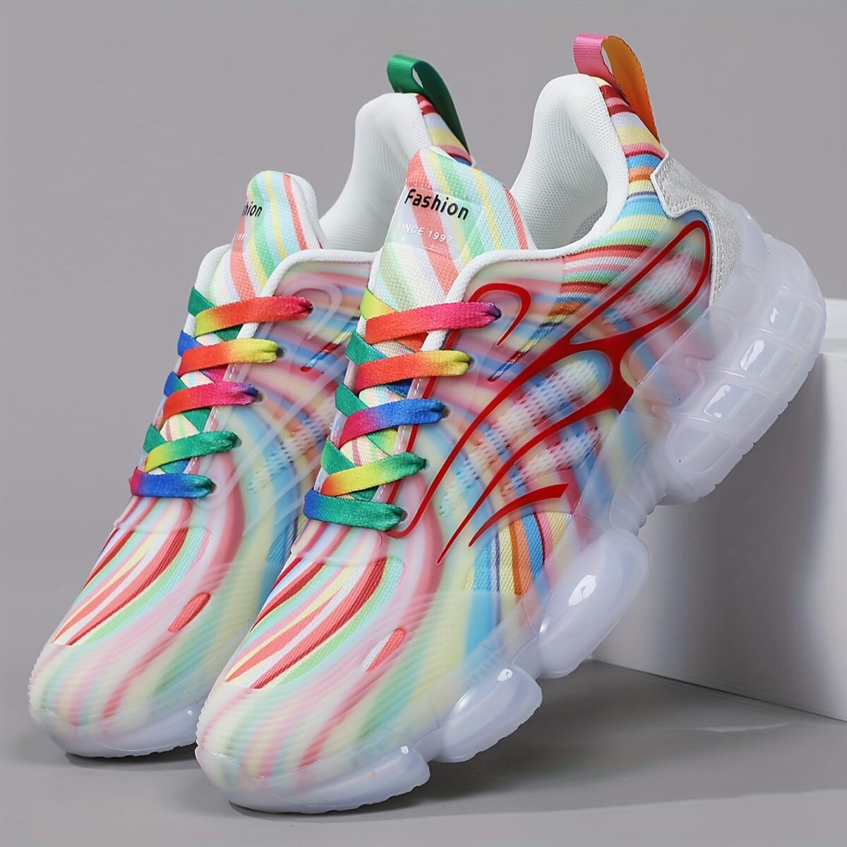 Newness Prism Rainbow Stripe Sneakers A vibrant pair of rainbow striped sneakers showcasing breathable comfort and stylish design perfect for all day wear