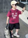 Stylish boys summer outfit alphabet print t shirt and cargo shorts set from Newness Perfect for summer adventures