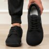 Newness Effortless Stride Wide Fit Sneakers in white showcasing the comfortable design and stylish look Perfect for all day wear