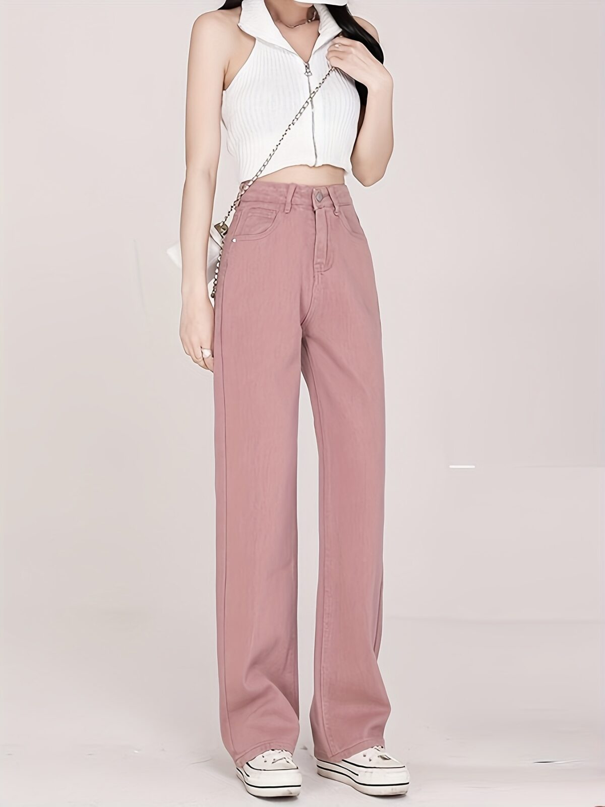 Newness Milan High Waisted Straight Leg Jeans Flattering fit timeless style A model wears the jeans