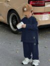 Newness Cozy Champ Boys Waffle Knit Set in soft waffle knit fabric featuring a hooded top and pants perfect for winter adventures