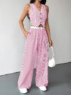 The Newness Riviera Striped Trouser Set in a flattering pose showcasing its relaxed fit and chic style Model is wearing the matching top and trousers