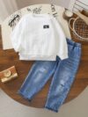 Stylish boys outfit long sleeve solid color top and ripped faux denim jeans perfect for spring and fall