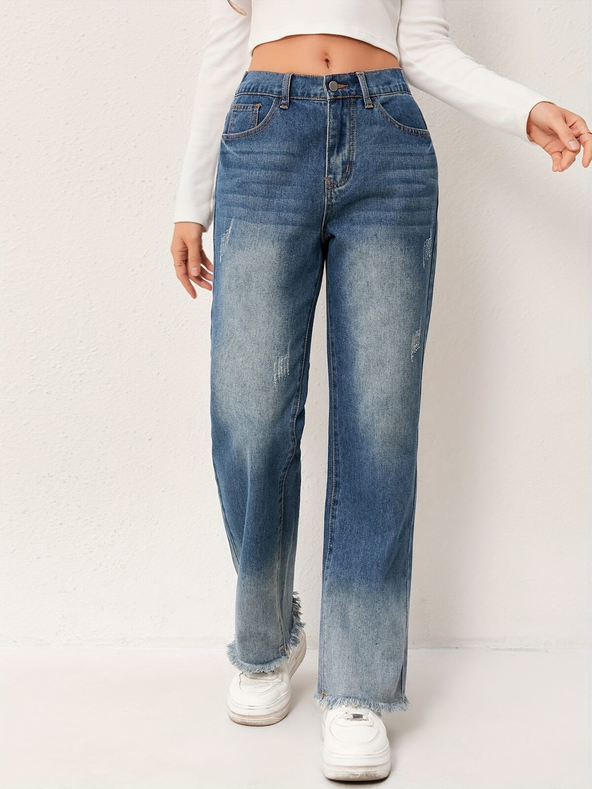 Newness Effortless Chic Straight Leg Jeans Flattering straight leg jeans in a versatile wash designed for both comfort and style Model showcases the perfect fit and drape