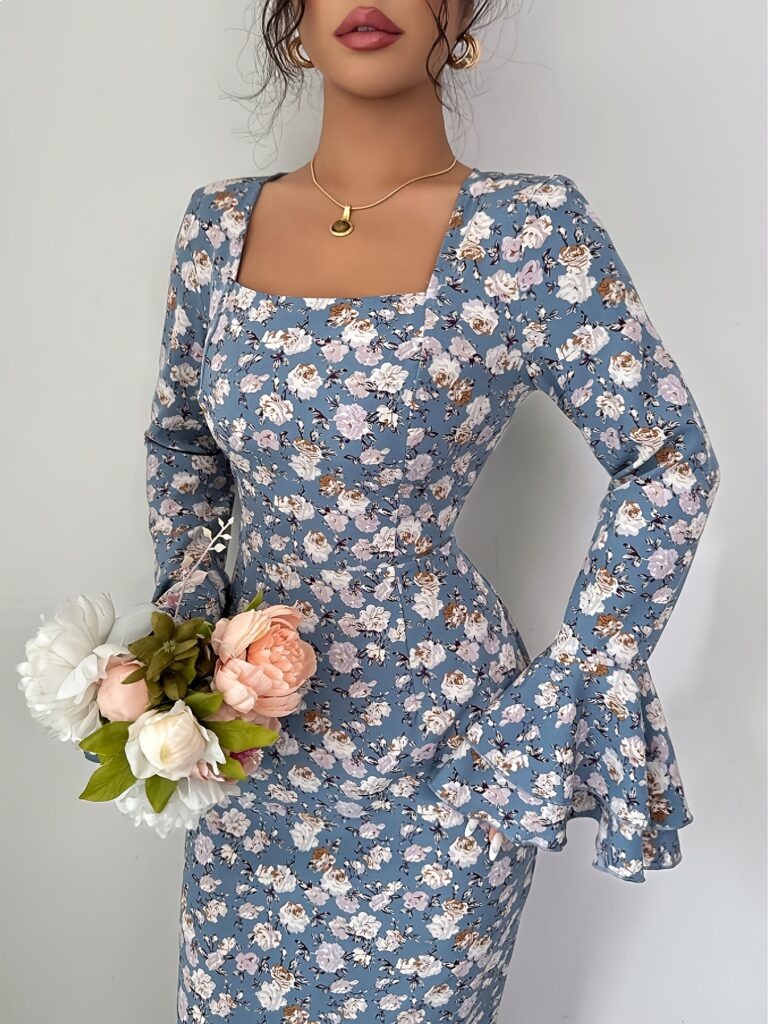 The Newness Casablanca Floral Print Maxi Dress, a stunning floor-length dress adorned with a vibrant floral print, perfect for any occasion.