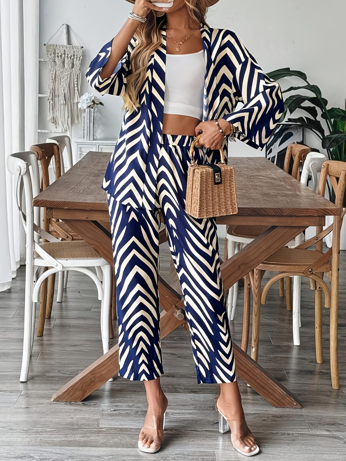 Stylish woman wearing a chic geometric print two piece set perfect for summer and fall The outfit features a flattering silhouette and vibrant print