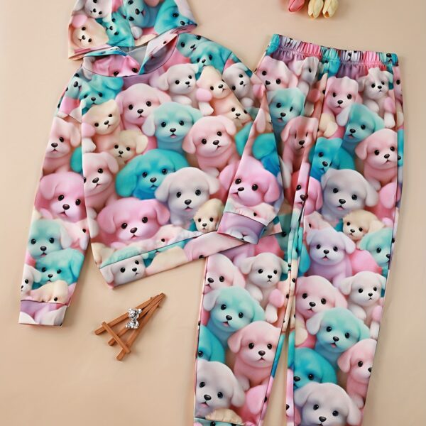 Adorable girl wearing a playful spring hues hooded sports suit, featuring a charming cartoon print. Perfect for spring adventures!