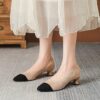 Womens black fabric stiletto heel pumps with a gold ankle strap