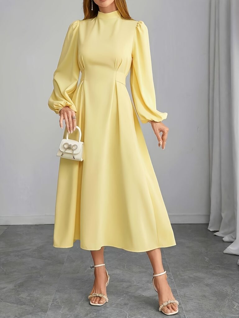 Sunlit Elegance Yellow A-Line Dress from Newness. A chic and versatile yellow dress, perfect for any occasion.