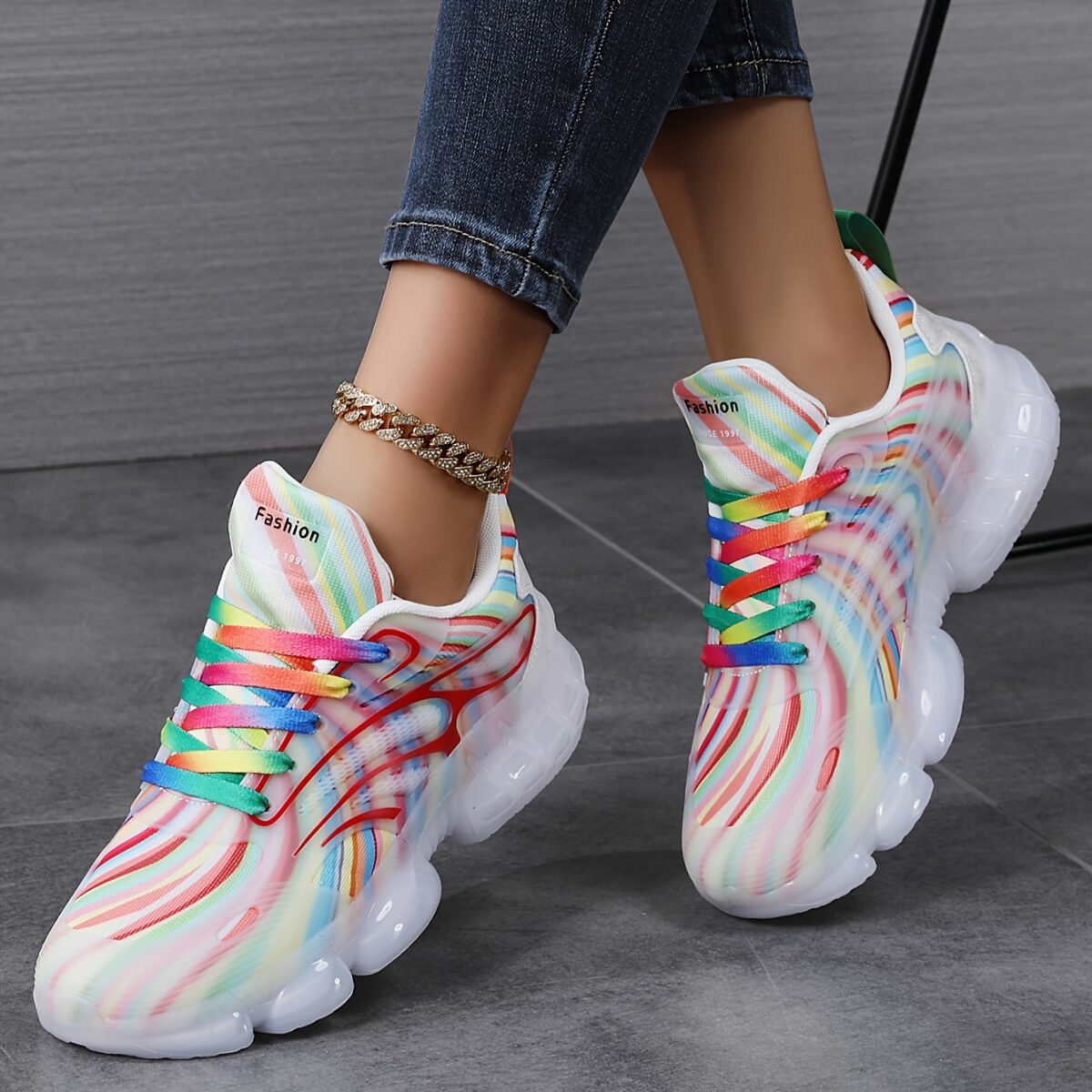 Newness Prism Rainbow Stripe Sneakers A vibrant pair of rainbow striped sneakers showcasing breathable comfort and stylish design perfect for all day wear