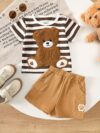 Adorable baby boy wearing Newness Cozy Cub Two Piece Set featuring a striped top with bear embroidery and matching shorts Perfect for spring and summer
