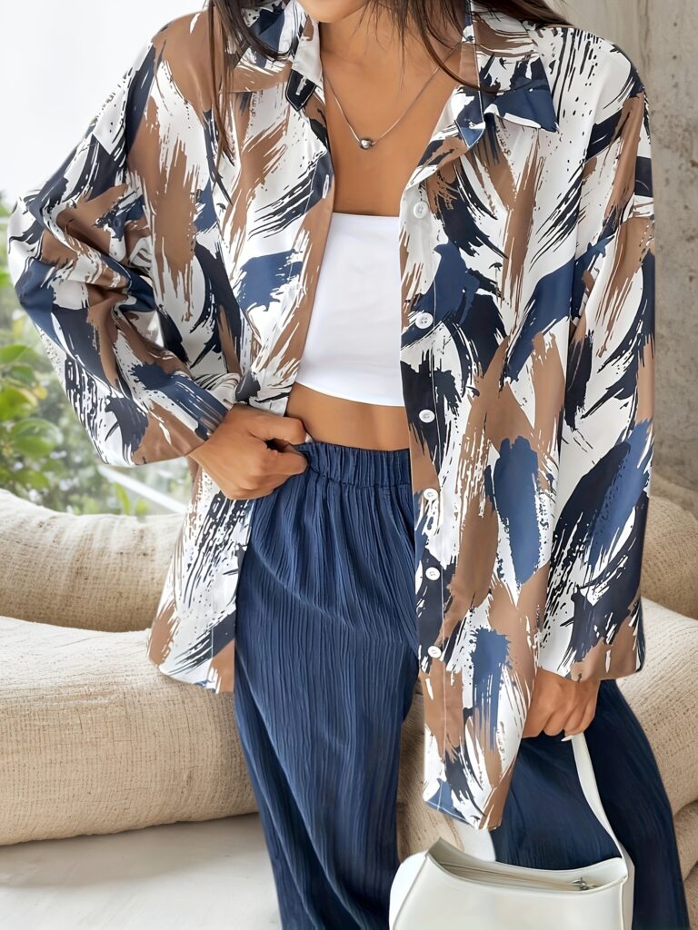 Effortlessly chic Casablanca Floral Print Set from Newness. This two-piece set features a loose-flowing silhouette and a vibrant floral print, perfect for any occasion.