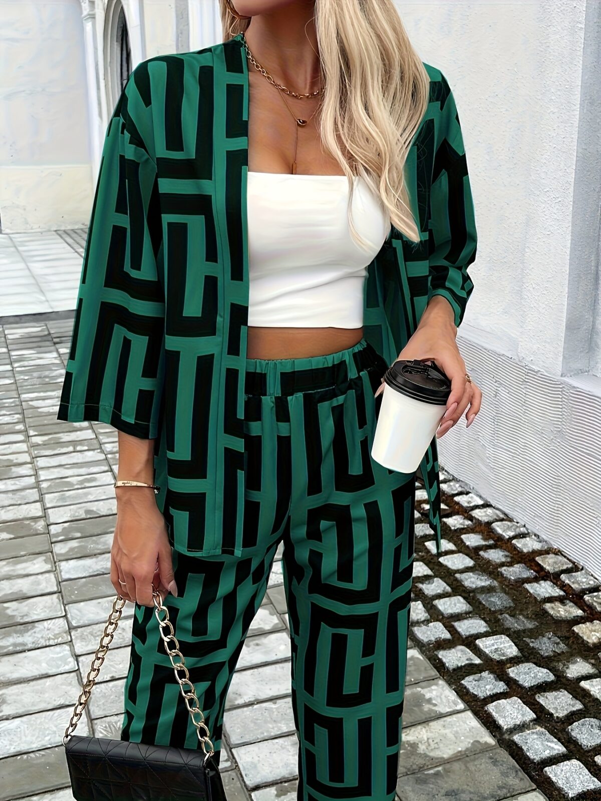 The Newness Modern Muse Geometric Print Set a chic two piece outfit featuring a modern geometric print perfect for any occasion