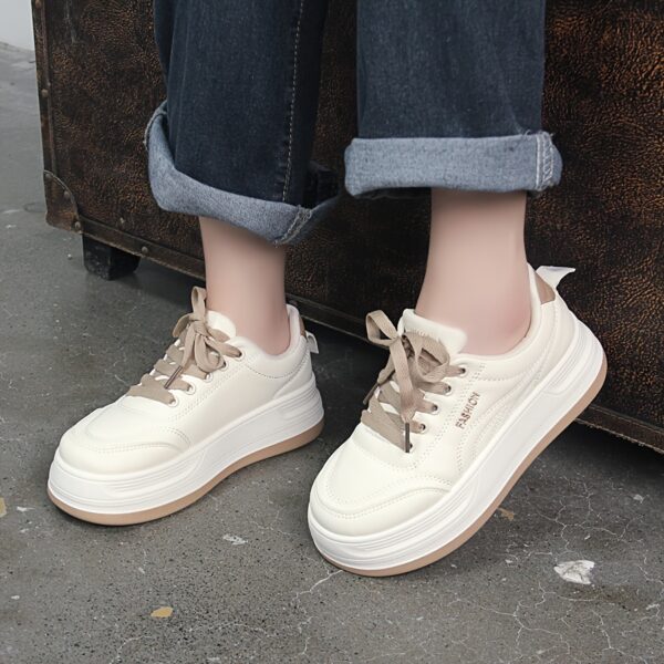 Newness white thick sole sneakers Chic comfortable and effortlessly cool footwear for everyday wear