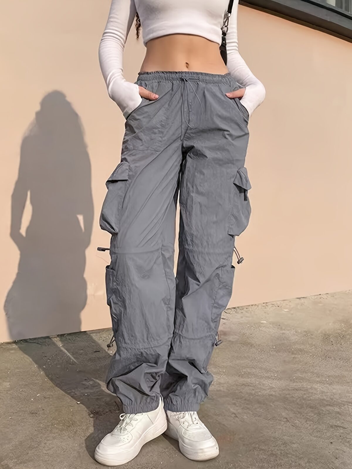 Model wearing stylish baggy NVFelix casual overalls showcasing the comfortable relaxed fit and Y2K inspired design