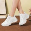 Stylish and breathable womens mesh sneakers by Newness perfect for all season wear Lightweight and comfortable design in a versatile color