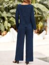 The Newness Milan Solid Color Pantsuit in a flattering pose This chic pantsuit crafted from smooth polyester is perfect for spring and fall The model showcases its versatile style and sophisticated fit
