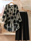 Cairo Chic Geometric Print Suit by Newness A stylish and modern geometric print suit perfect for spring and summer