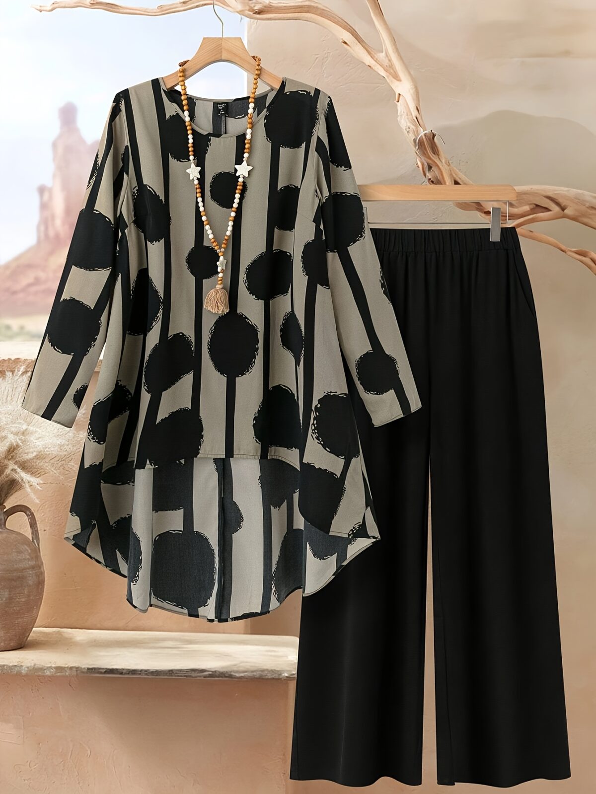 Cairo Chic Geometric Print Suit by Newness A stylish and modern geometric print suit perfect for spring and summer