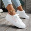 Newness Blush Butterfly Lace Up Sneakers Chic blush colored sneakers with butterfly accents and lace up closure perfect for spring